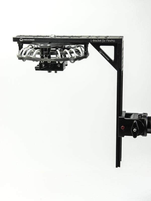 complete camera rig mounted on carbon isolator for stabilization